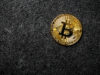 Bitcoin coin on black background
