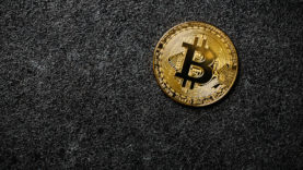 Bitcoin coin on black background