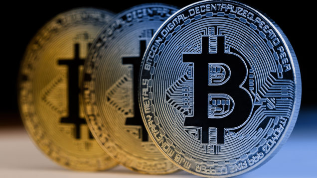 closeup of golden bitcoin metallic coins